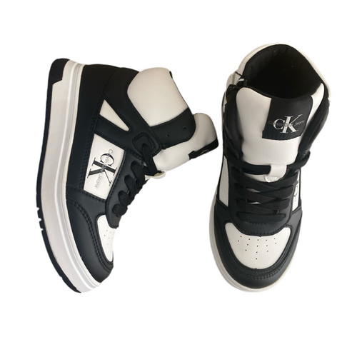 Sneakers bambino bianche e nere con logo laterale e linguetta, stile sportivo