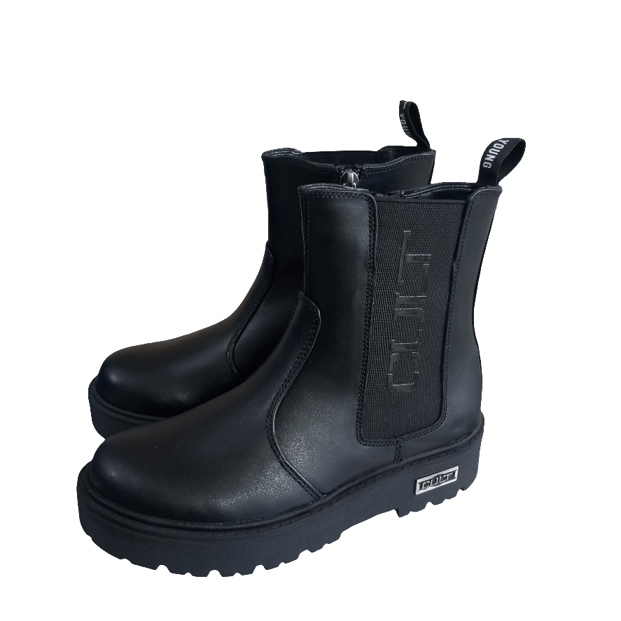 Tronchetti neri da bambino in pelle con suola alta e logo laterale visibile, stile casual